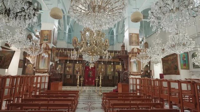 Interior View of Ancient Orthodox Christian Church with Crystal Chandeliers
