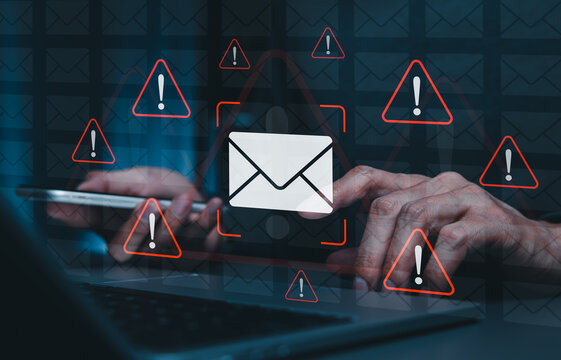 Email security alert concept. Person using laptop with warning envelope icons. phishing detection, suspicious message prevention, spam filtering, cyber threat monitoring, secure communication workflow