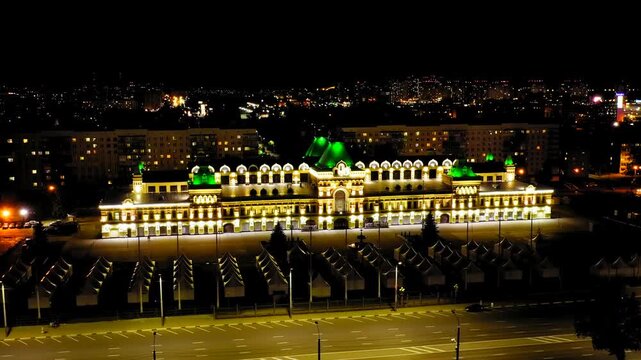 Nizhny Novgorod, Russia. Drone footage at night on the building of the Nizhny Novgorod fair. 19th century building. Text in front of the building - Russia is my story. Drone footage