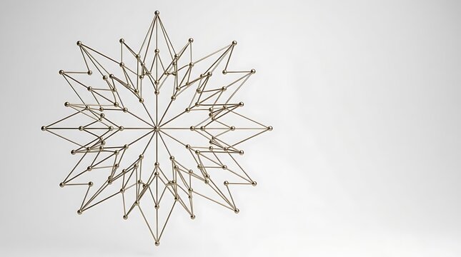 Ornate gold wire geometric star sculpture on white background