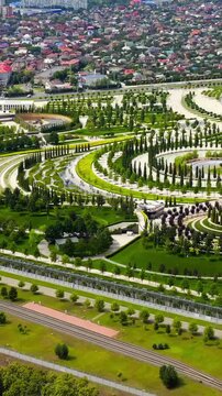 Vertical video. Krasnodar, Russia. Public Park Krasnodar (Galitsky Park). Summer Drone footage. Rich colors