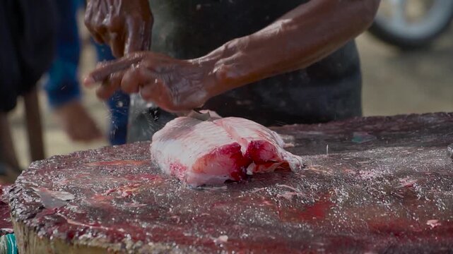 traditional Acehnese fish cutting