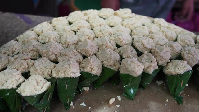 Traditional Kumaon Sweet Singori Made of Khoya and Wrapped in Green Leaves