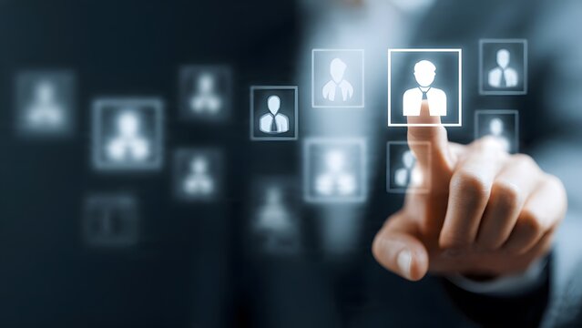 Hand touching screen with highlighted person icon symbolizing job selection and recruitment process human resources selecting employee for career opportunity talent management background.