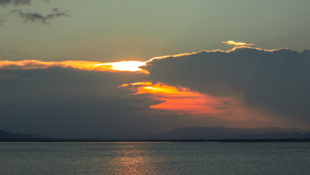 Dramatic Sunset Over Calm Water