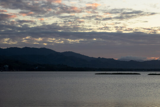 Water Landscape at Dusk with Mountains
