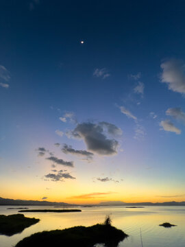 Sunset Over Water with Islands