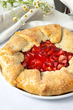 Rustic homemade strawberry galette with sugar crust