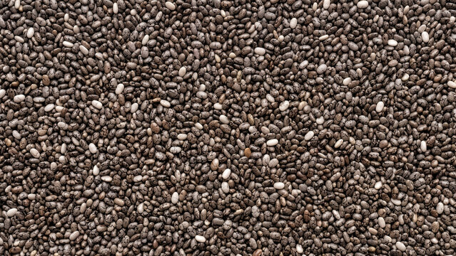 Close up of raw organic chia seeds texture background