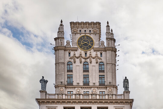 Gate of Minsk Tower with Big Soviet Clock and Sculptures in Belarus