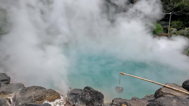 Umi Jigoku is largest among the Beppu Jigoku hot springs. The beautiful cobalt blue color is due to iron sulphate in the hot spring water Beppu Oita Japan - Landscape Travel nature original 