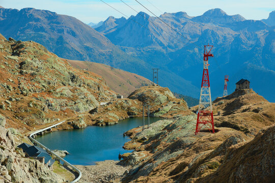 Alpine hut Capanna Giulia Maria and cableway pylon leading to the Lago Nero dam and hydroelectric plants. Valgoglio, Orobie Alps, Lombardy, Italy.
