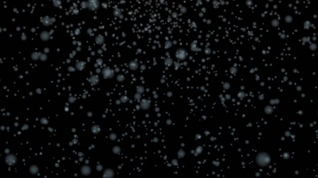 Snowflakes falling from a dark winter sky, creating a mesmerizing pattern in heavy snowfall, ideal for winter weather concepts.
