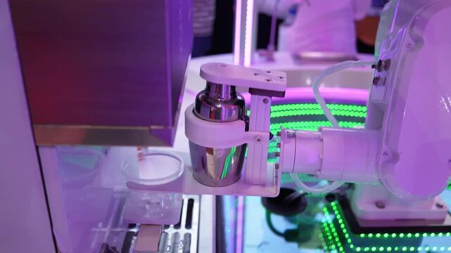 AI robotic technology as bartender in a bar and restaurant. Industrail robotic with AI technology use for produce beverage menu in pub and bar