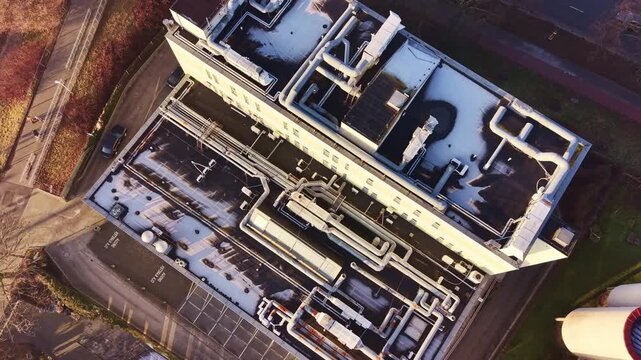 Modern commercial rooftop with large ventilation infrastructure