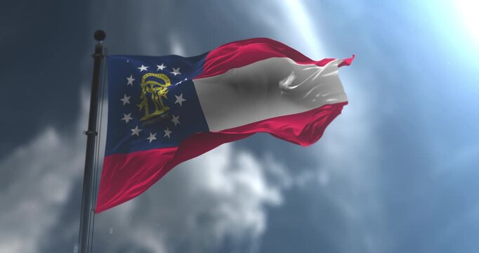 Flag of american state of Georgia waving with a cloudy sky. Loop. Slow Motion