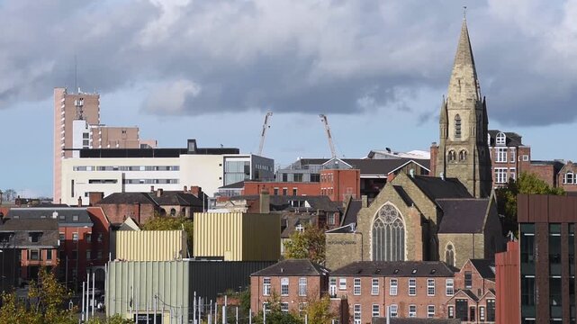  Overlooking a Nottingham tram passing Nottingham Railway Station with the historic Lace Market Neighborhood in the background, near Old Market Square in Nottingham, England.