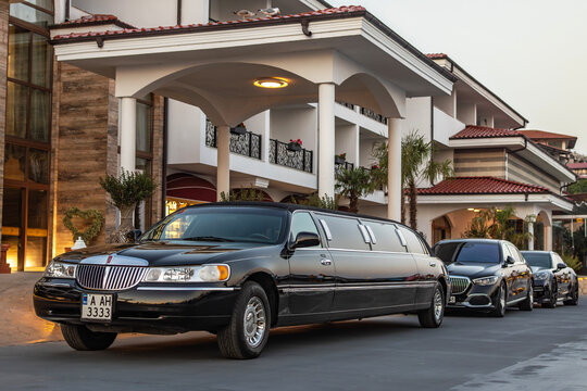 Marina Dinevi, Sveti Vlas, Burgas, Bulgaria - July.18.2026: Luxury black stretch limousine and premium cars parked at Marina Dinevi resort in Sveti Vlas, Burgas, Bulgaria