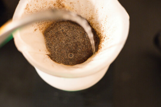 Close-up of V60 drip coffee brewing method with pour over