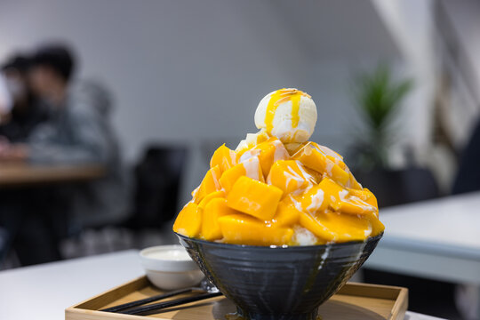 Refreshing mango shaved ice dessert bowl