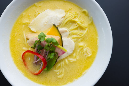 Fresh japanese chicken ramen served in bowl