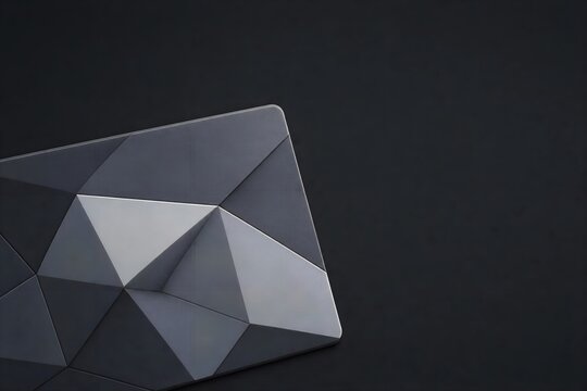 Minimalist geometric credit card mockup, matte grey low poly bank card on black background, premium plastic membership card with 3D triangle pattern
