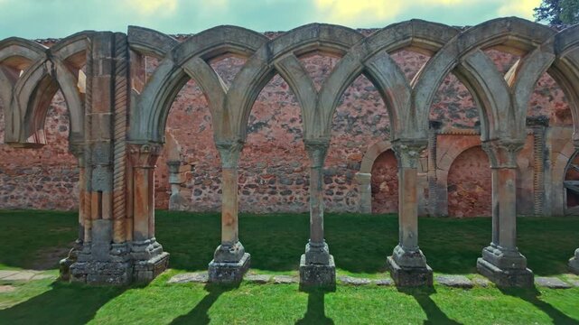 Stone arches of the historic Monastery of San Juan de Duero cloister in Soria