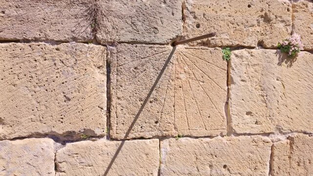 Ancient stone sundial marking the passage of time
