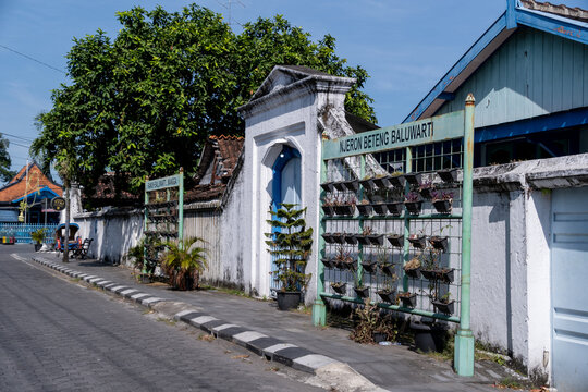 Solo, Indonesia - June 16, 2026: Street view with a traditional arch gate in Njeron Beteng Baluwarti within the Keraton Surakarta complex.