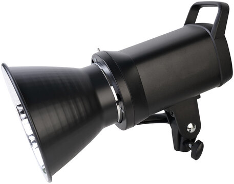 Studio shot of black professional studio strobe light with reflector equipment isolated on a transparent background