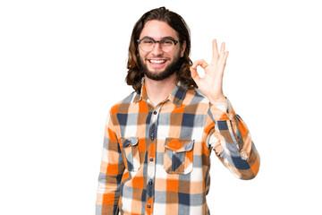 Naklejka premium Young handsome man over isolated chroma key background showing ok sign with fingers
