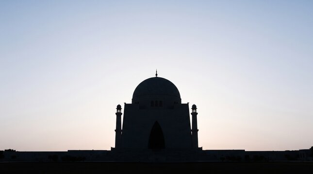 Silhouette of Mazar-e-Quaid Mausoleum in Karachi, Pakistan, at Sunset, Iconic National Landmark Architecture, Travel Photography Background