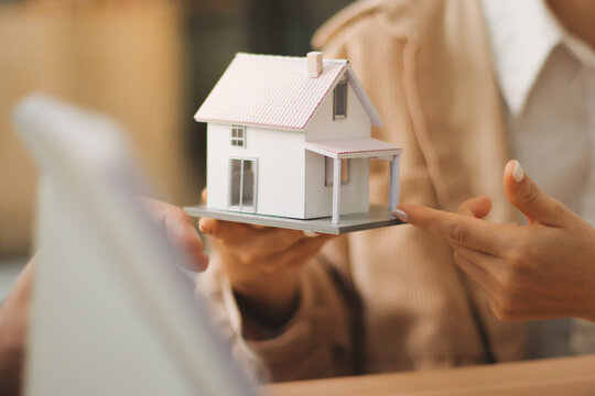 Rental agreement, Sale agent deal to agreement successful home loan contract with customer and sign agreement contract Insurance home concept..