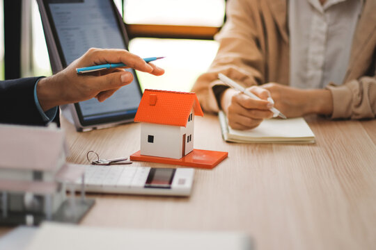 Rental agreement, Sale agent deal to agreement successful home loan contract with customer and sign agreement contract Insurance home concept..