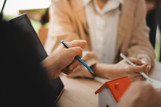 Rental agreement, Sale agent deal to agreement successful home loan contract with customer and sign agreement contract Insurance home concept..