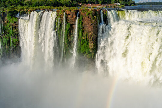 Powerful waterfall with rainbow in the tropical rainforest of Brazil