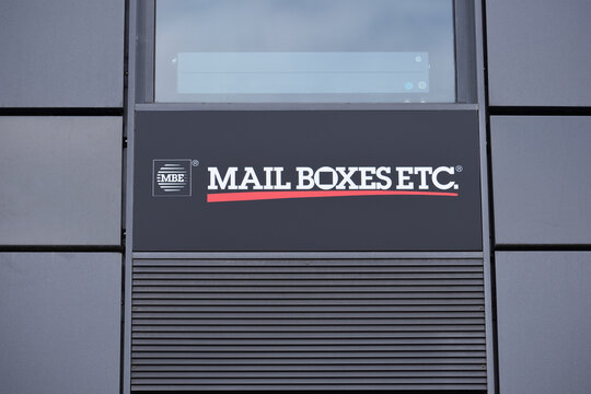 MBE Mail Boxes Etc company office with signage, logo, emblem on the facade. WARSAW, POLAND - JUNE 18, 2026