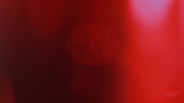 Textured Ruby Red Bokeh Orbs with Sweeping Light Leaks - High Contrast Glass Effect Overlay⁠