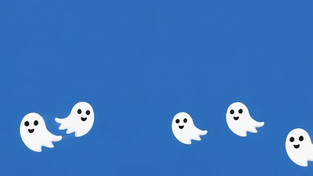 Cute cartoon ghosts floating in a blue sky during a playful Halloween celebration