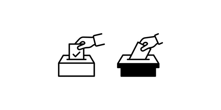 Hand inserting a ballot paper into a voting box for election and democracy concepts