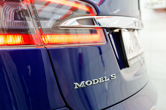 Ulyanovsk, Russia - March 16, 2019: Close-up Rear lights and car nameplate of a Tesla Model S electric car
