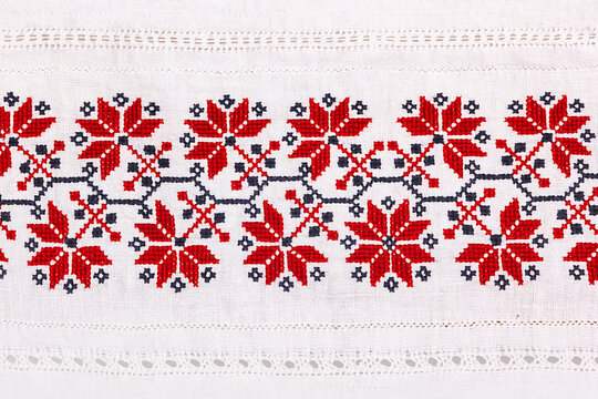 Close-up of traditional folk cross-stitch embroidery pattern.
