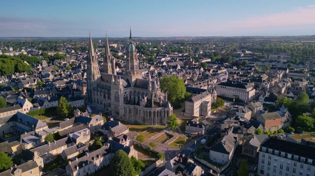 The drone aerial footage of Bayeux Cathedral at sunrise, also known as Cathedral of Our Lady of Bayeux is a Roman Catholic church located in the town of Bayeux in Normandy, France.