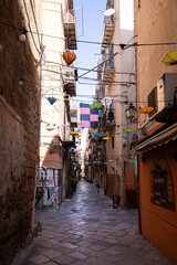 Fototapeta premium Palermo, Italy; January 1st: Streets in the old part of the city and traditional Sicilian shops.