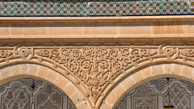 Bas relief carvings on the arches in the courtyard of the mausoleum, in the Zawiya of Sidi Sahib in Kairouan, Tunisia