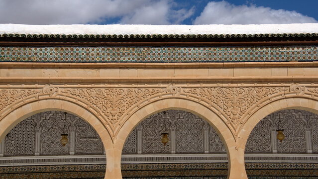 Bas relief carvings on the arches in the courtyard of the mausoleum, in the Zawiya of Sidi Sahib in Kairouan, Tunisia