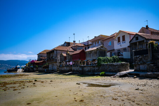 Traditional Granite H&oacute;rreos and Coastal Architecture along the Narrow Streets of Combarro in Poio, Galicia, Spain