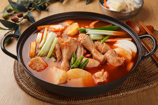 Korean spicy braised chicken stew dak-bokkeum-tang with potato and green onion