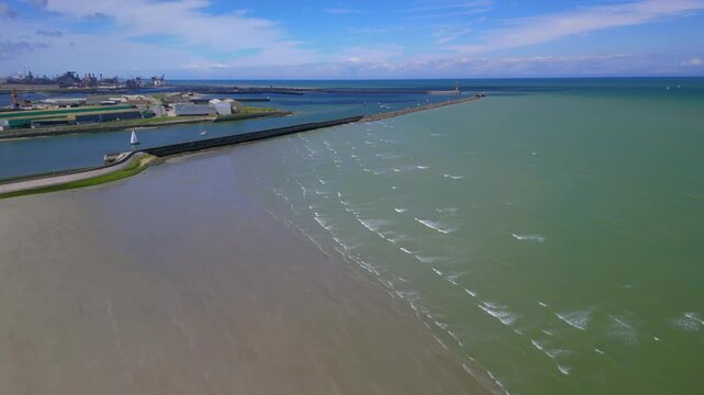 Aerial footage of Saint-Pol lighthouse and Dunkirk beach, France.