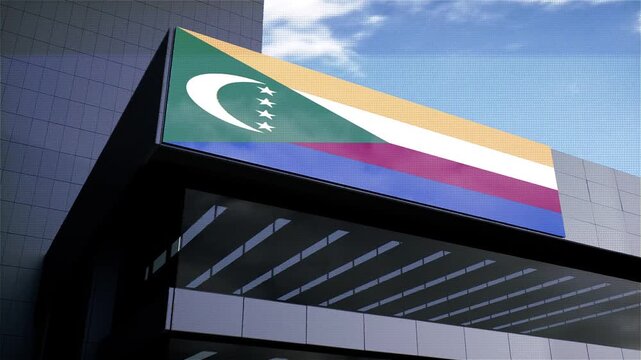 Comoros Flag on Building with Sky in Background